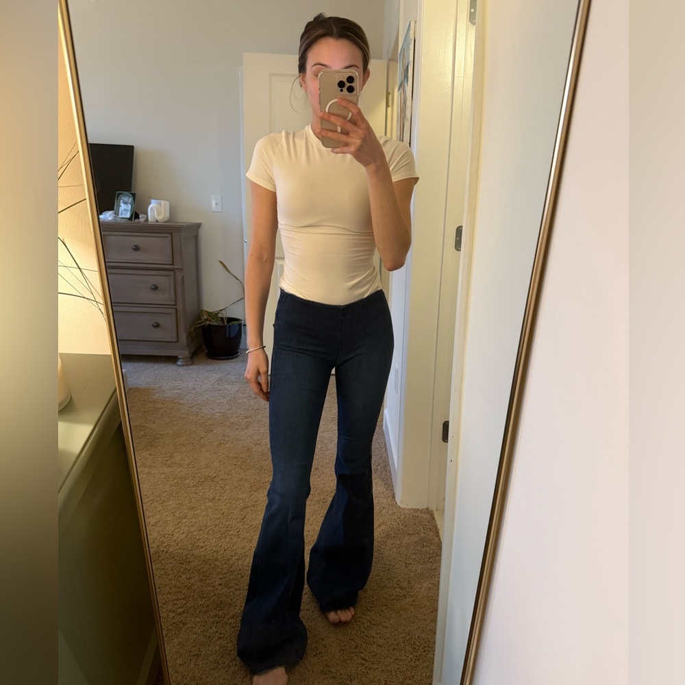 We The Free Penny Pull Free People -On Flare Jeans in dark denim 
Size: 24